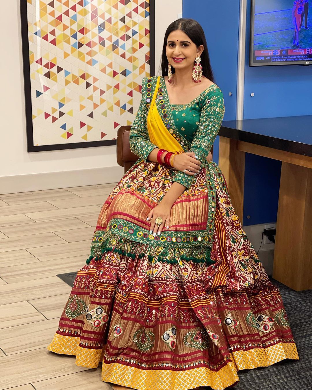 Red Green Lehenga Choli with Mirror work and attached Yellow Dupatta