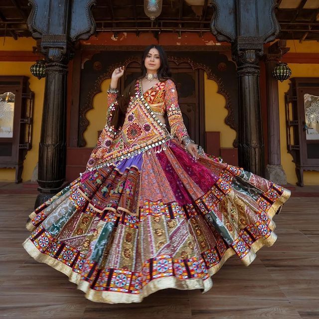 Multi Mustard Lehenga Choli with Mirror work and attached Black Dupatta