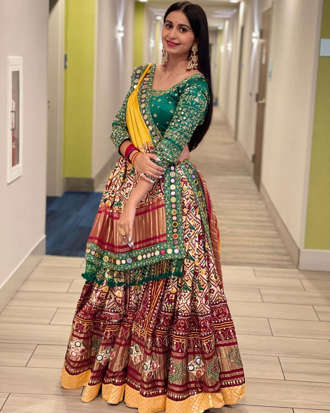 Red Green Lehenga Choli with Mirror work and attached Yellow Dupatta