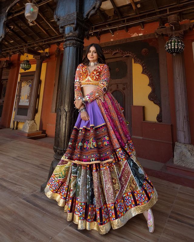 Multi Mustard Lehenga Choli with Mirror work and attached Black Dupatta