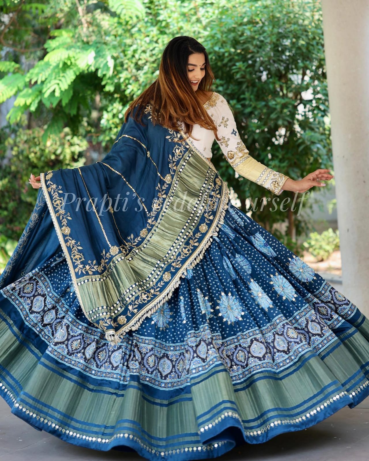 blue Lehenga Choli with Mirror work and attached Rama Dupatta