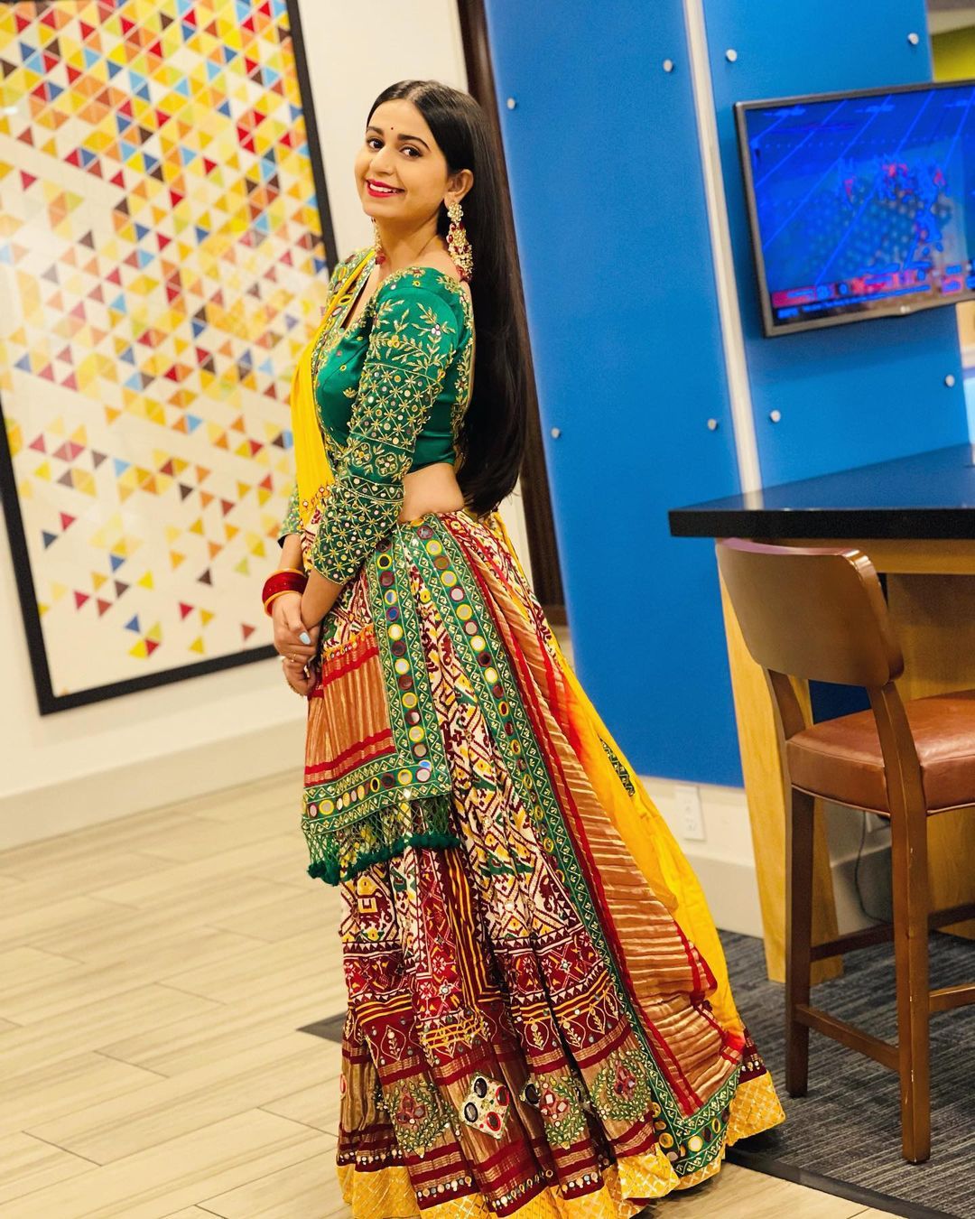 Red Green Lehenga Choli with Mirror work and attached Yellow Dupatta