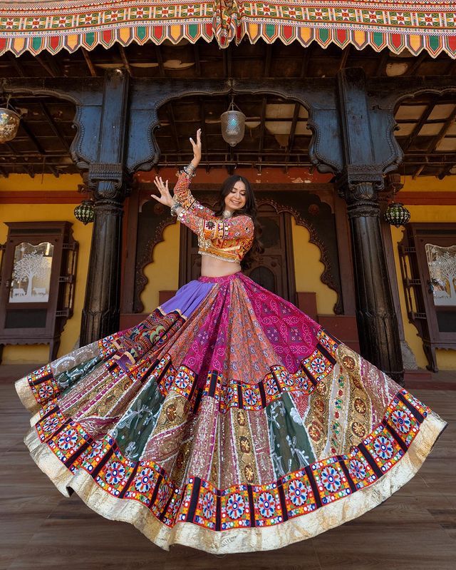 Multi Mustard Lehenga Choli with Mirror work and attached Black Dupatta