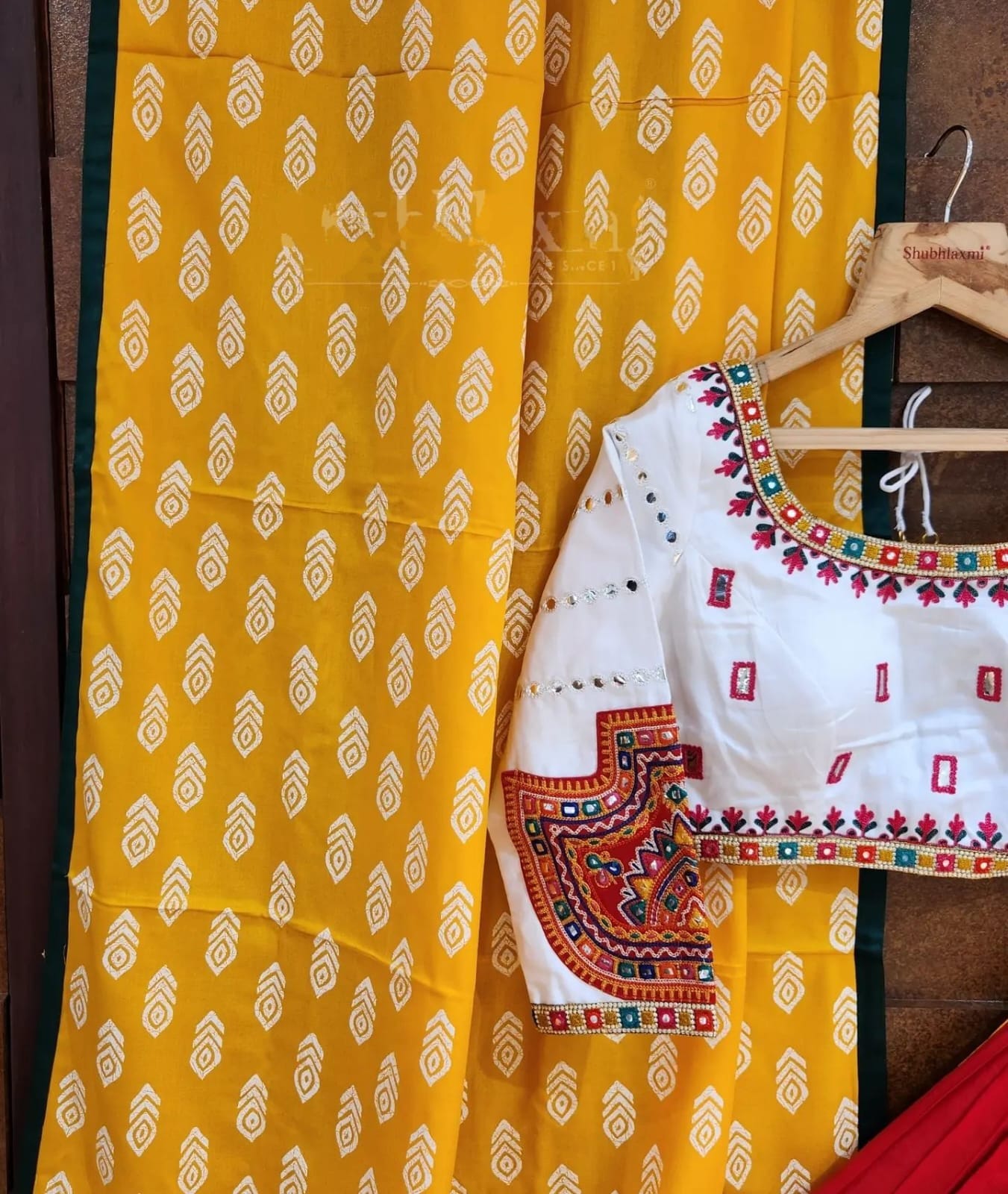 Bottle Green Bottle Green Lehenga Choli with Mirror work and attached Yellow Dupatta
