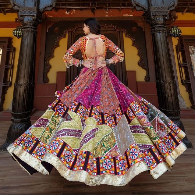Multi Mustard Lehenga Choli with Mirror work and attached Black Dupatta