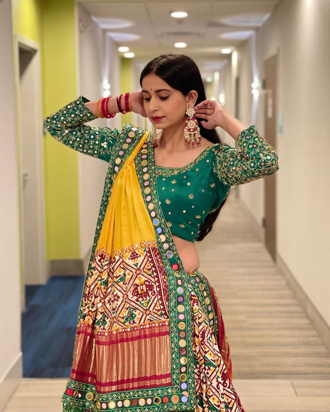 Red Green Lehenga Choli with Mirror work and attached Yellow Dupatta