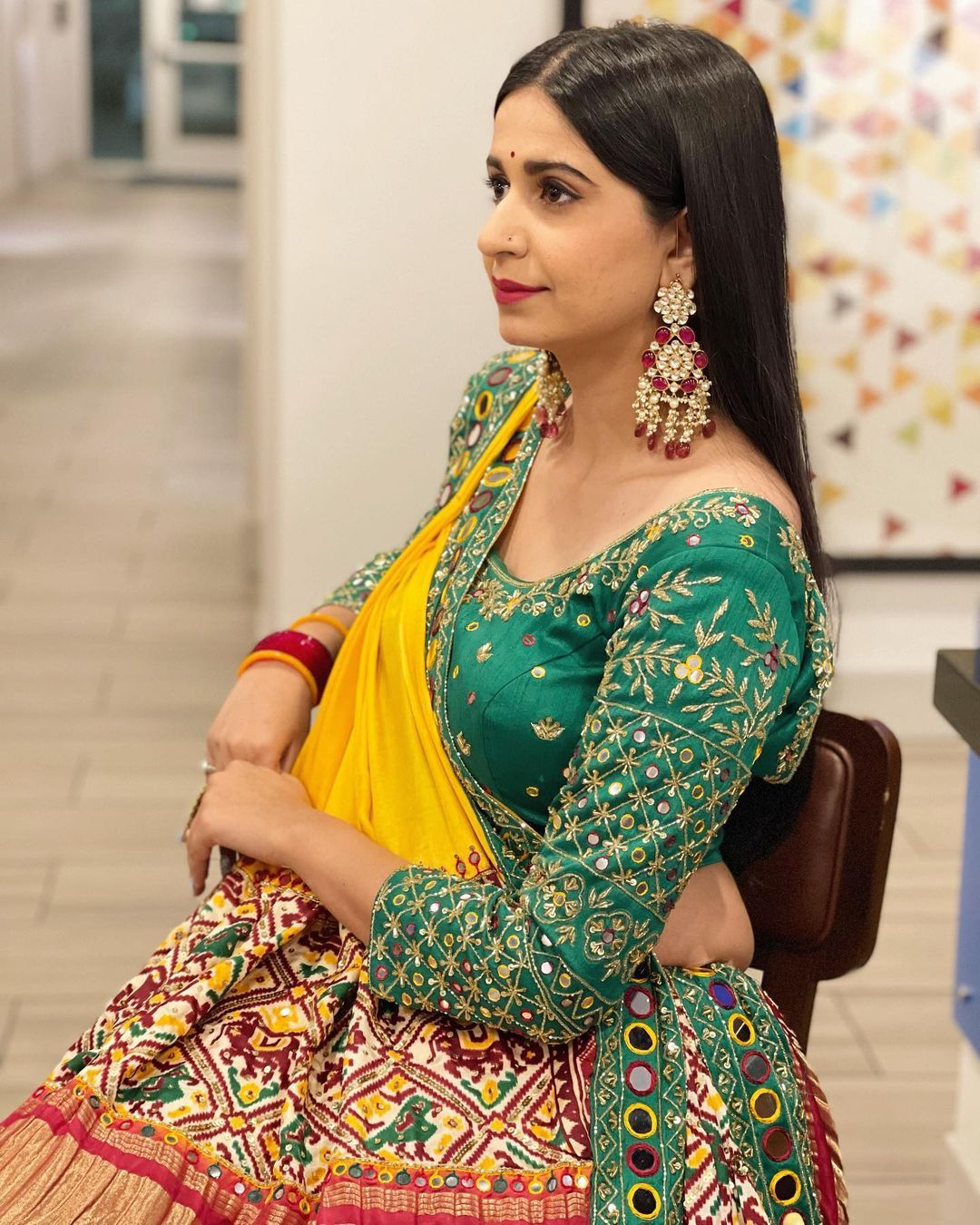Red Green Lehenga Choli with Mirror work and attached Yellow Dupatta