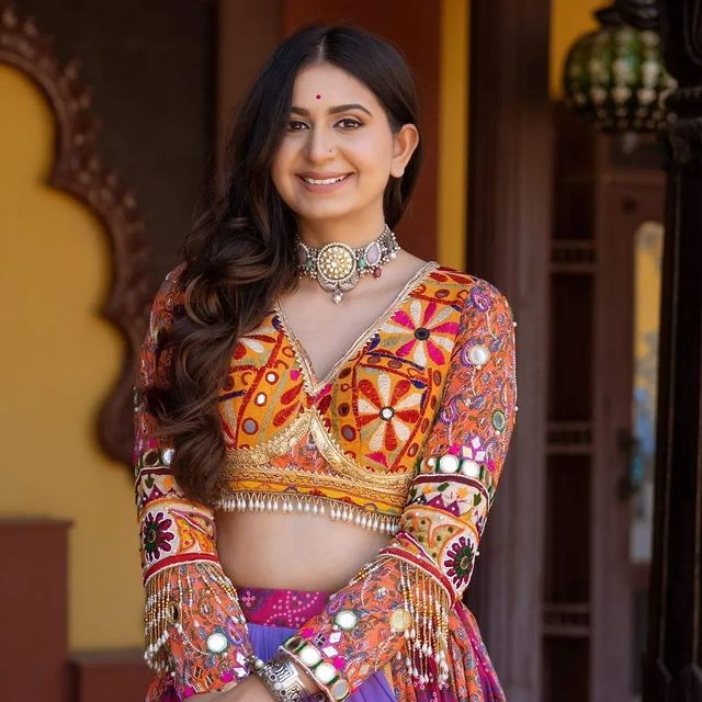 Multi Mustard Lehenga Choli with Mirror work and attached Black Dupatta