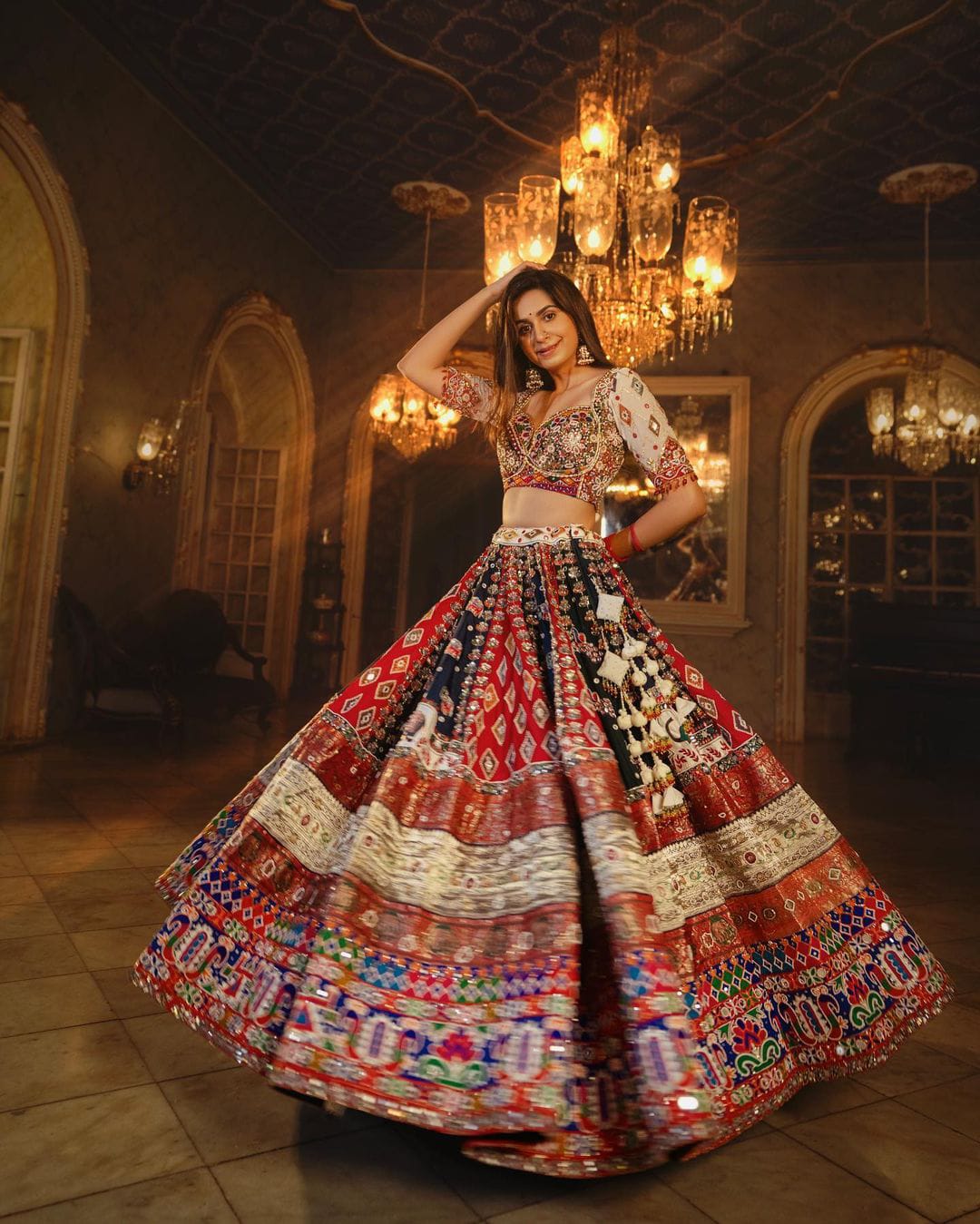 Multi Colour Lehenga Choli with Mirror work and attached Pink Dupatta