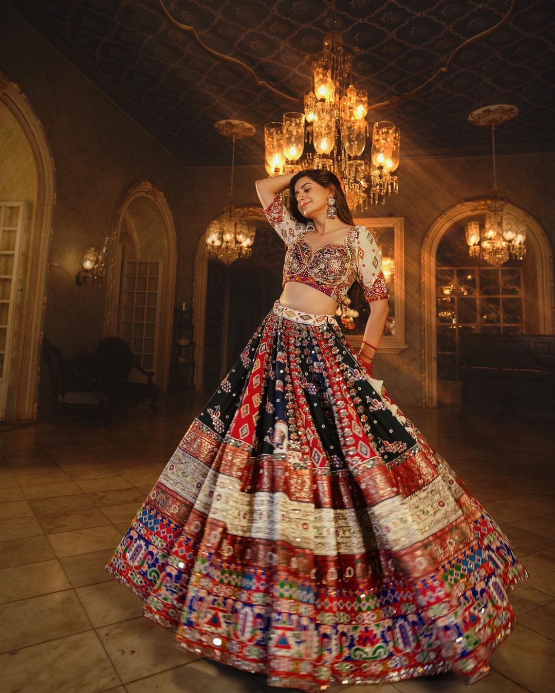 Multi Colour Lehenga Choli with Mirror work and attached Pink Dupatta